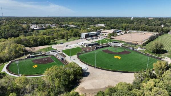 A aerial view of a field and trees